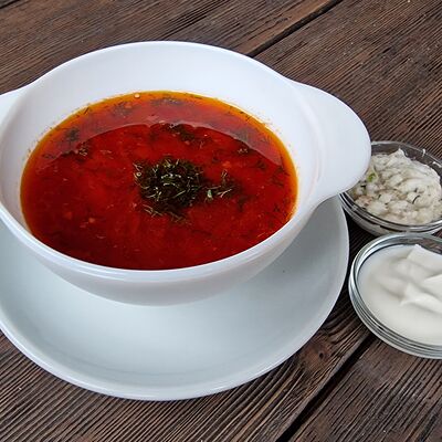 Борщ домашний с языком в Пельмэн по цене 265 ₽