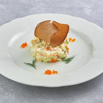 Салат оливье с копченой стерлядкой в Царь по цене 750 ₽