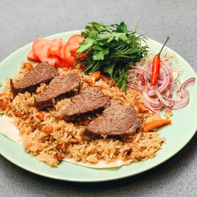 Плов узбекский по-домашнему в Рестомаркет Китчен по цене 420 ₽