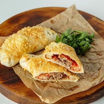 Кальцоне мясное в Перчини на огне по цене 320