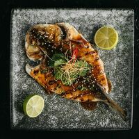 Сибас в азиатском стиле в Shima