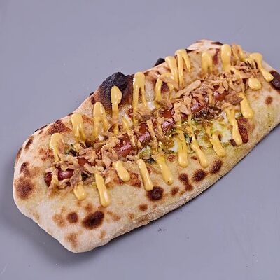 Пицца-дог Песто в Кафе Итальянцы по цене 450 ₽