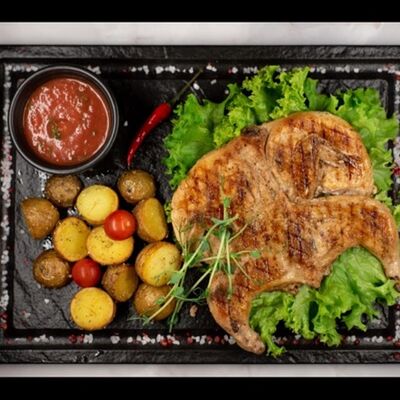 Цыпленок корнишон с картофелем по-провански в Taka Bar & Grill по цене 1190 ₽