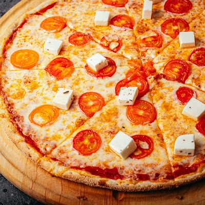 Пицца Маргарита в Bourbon по цене 470 ₽