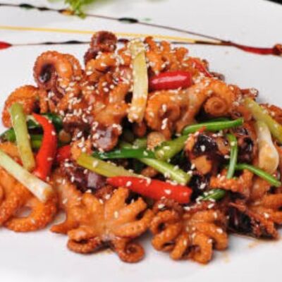 Жареные осьминоги в ГУаНЬ ЯНЬ по цене 2150 ₽