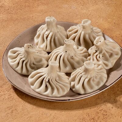 Хинкали с курицей в Ачарули по цене 480 ₽