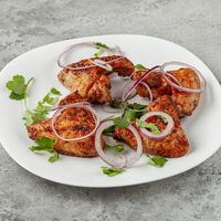 Шашлык из куриных крылышек в Вкусно на углях