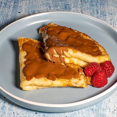 Блины с малиной и шоколадомв FRUTERO по цене 620 ₽