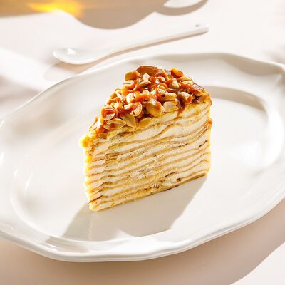 Торт Блинный с вареной сгущенкой в Кукумбер по цене 590 ₽