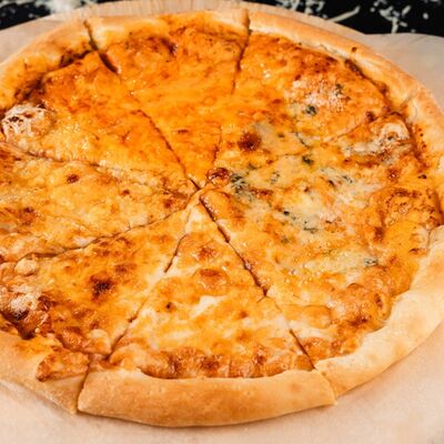 Пицца Четыре сыра в РАХАТ по цене 830 ₽