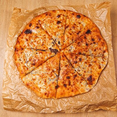 Осетинский пирог с мясом в Nel tempo по цене 620 ₽