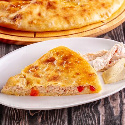 Пирог с курицей, болгарским перцем и сыромв Осетинские Пироги по цене 1370 ₽