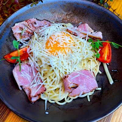 Паста Карбонара с беконом и яйцом в Cubby Bar по цене 540 ₽