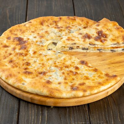 Пирог с картошкой и грибами в Осетинские пироги Вкусно Пироги по цене 850