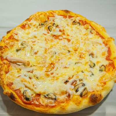 Пицца Морская в Дубай по цене 1031 ₽