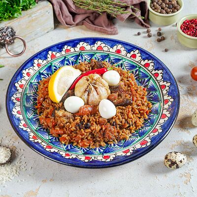 Плов узбекский с говядиной в Домашний Вкус по цене 700 ₽