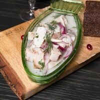 Сугудай по-бурятски из муксуна с бородинскими тостами в Русский паб