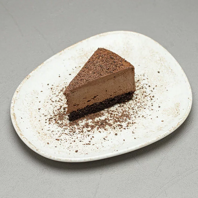 Чизкейк с темным шоколадом в Диккенс по цене 350 ₽