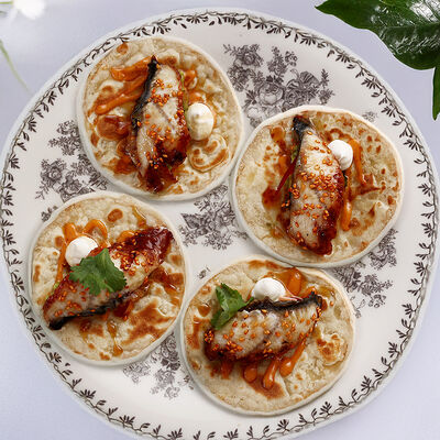 Тако с угрем, кремом фета и гуакамоле в Юность у моря по цене 920 ₽