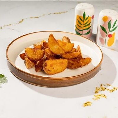 Картофель по-деревенски 100гр в TAVO ROTTO по цене 199 ₽