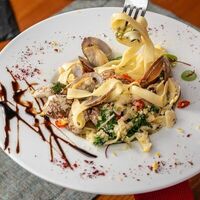 Феттуччине с вонголе и лимонным соусом в Лимончини