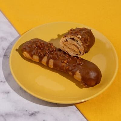 Эклер Карамельный в Пекарня Буханка по цене 169 ₽