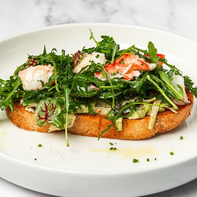 Брускетта с крабом и вялеными томатами в Osteria Mario по цене 980 ₽
