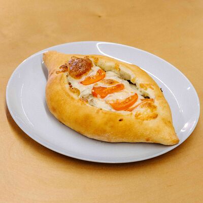 Хачапури мясной с сыром сулугуни в Бебо по цене 520 ₽