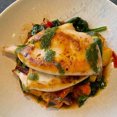 Кальмар с картофелем и томатамив Bistro Оstro по цене 995 ₽