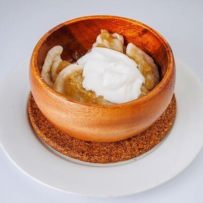 Вареники с картофелем и квашеной капустой в Черная Кошка по цене 459 ₽