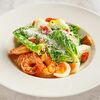 Салат Цезарь с креветками в Osteria Mario по цене 960