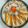 Ломтики свинины с картофельными дольками, в сливочно-грибном соусе в Пряности по цене 950