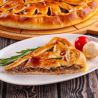 Пирог с говядиной и грибамив Осетинские Пироги по цене 1500 ₽