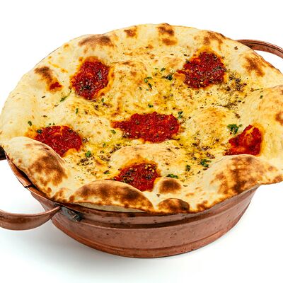 Манакиш с хариссой в Maroon по цене 350 ₽