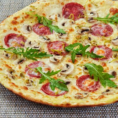 Пицца с копченой колбаской, грибами и картофелем в Pizza-house по цене 560 ₽