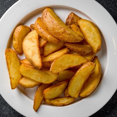 Картофель дольками в Шоти по цене 190