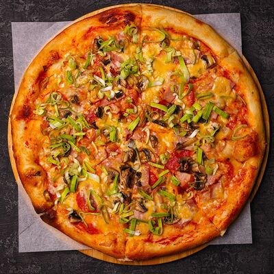 Фирменная пицца в Kitchen lab по цене 1090 ₽