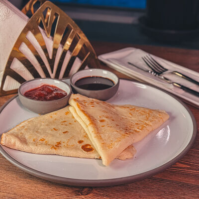 Блин с маслом в Масленица по цене 150 ₽