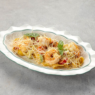 Тальятелле с креветками и овощами в Peperoni по цене 890 ₽