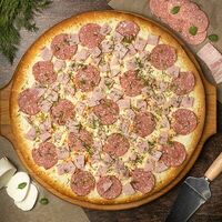 Со ле миа на тонком тесте в E La Mia Pizza