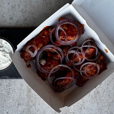 Куриные крылышки барбекю в Еду домой по цене 540 ₽