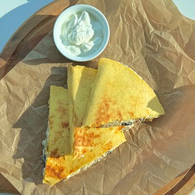 Кесадилья с курицейв Рукоста по цене 510 ₽