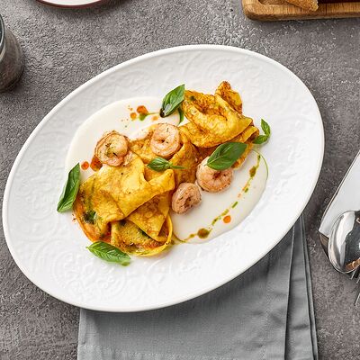 Тыквенные блины с креветками и кокосовым соусом в Lava по цене 660 ₽