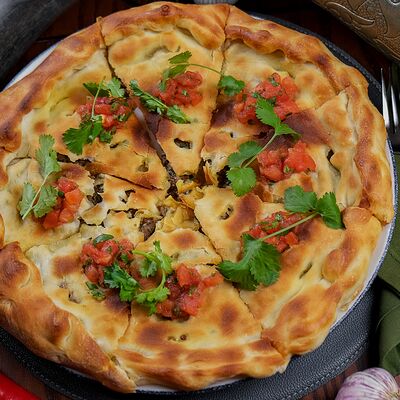 Осетинский пирог с мясом в Утомленные солнцем по цене 950 ₽