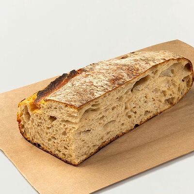 Пшеничный хлеб Перле (четверть) в Кофемания по цене 650 ₽