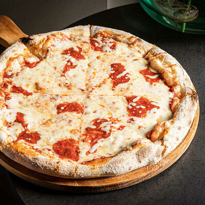 Пицца Маргарита в Качуко по цене 660 ₽