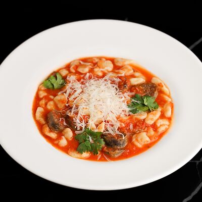 Галушки с горной колбасой в Nest по цене 580 ₽