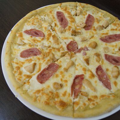 Пицца Сытый карапуз в ОстроVok по цене 950 ₽