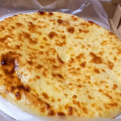 Осетинский пирог с мясом в Осетинские пироги по цене 650 ₽