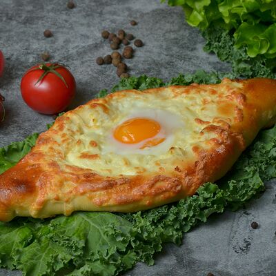 Хачапури по-аджарски с яйцом мини в Шашлычный дворик по цене 275 ₽